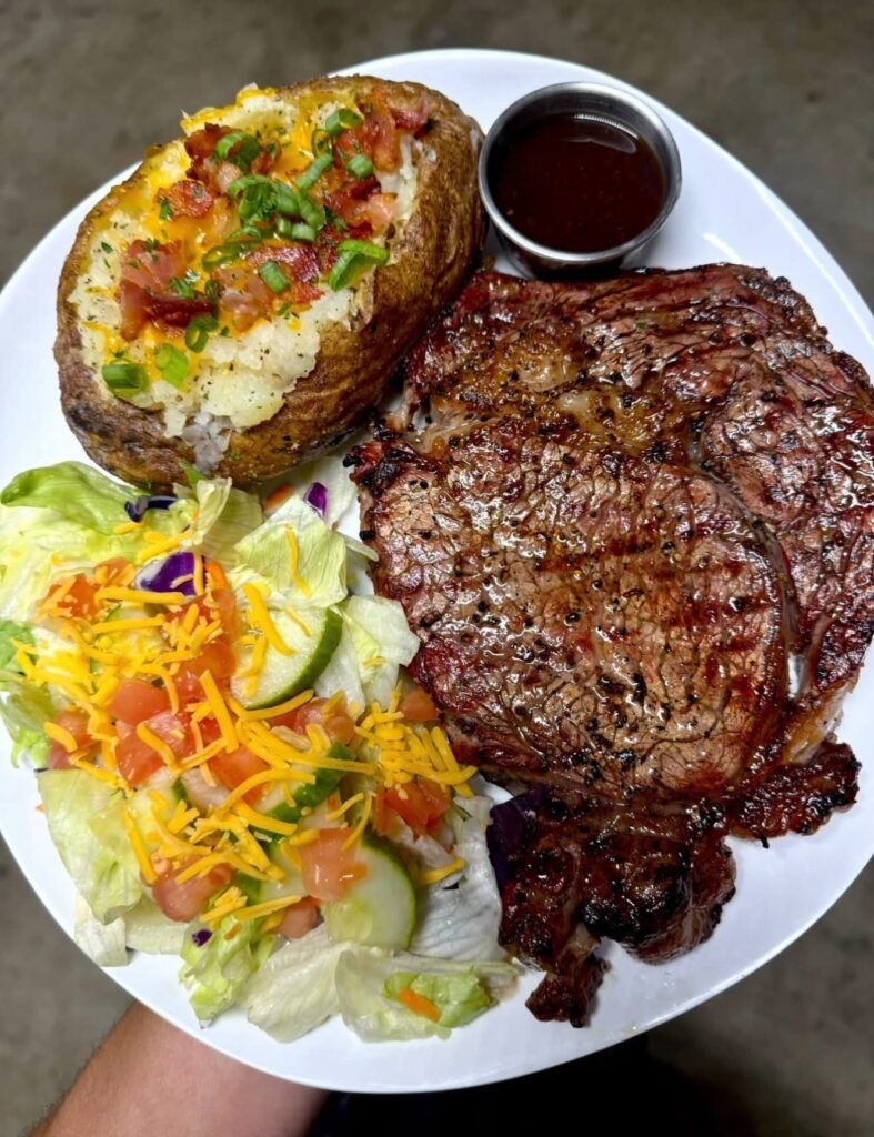 Grilled Ribeye Steak with Loaded Baked Potato