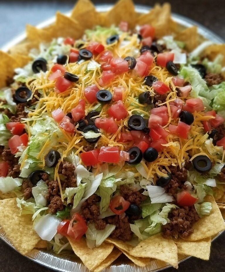 Loaded Beef Taco Salad with Crunchy Tortilla Chips, Cheddar, Tomatoes & Olives